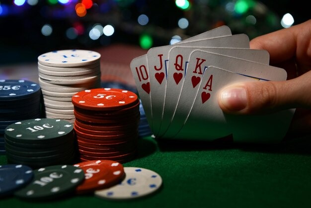 Live Baccarat table on royaltogel with professional croupier dealing cards in real time